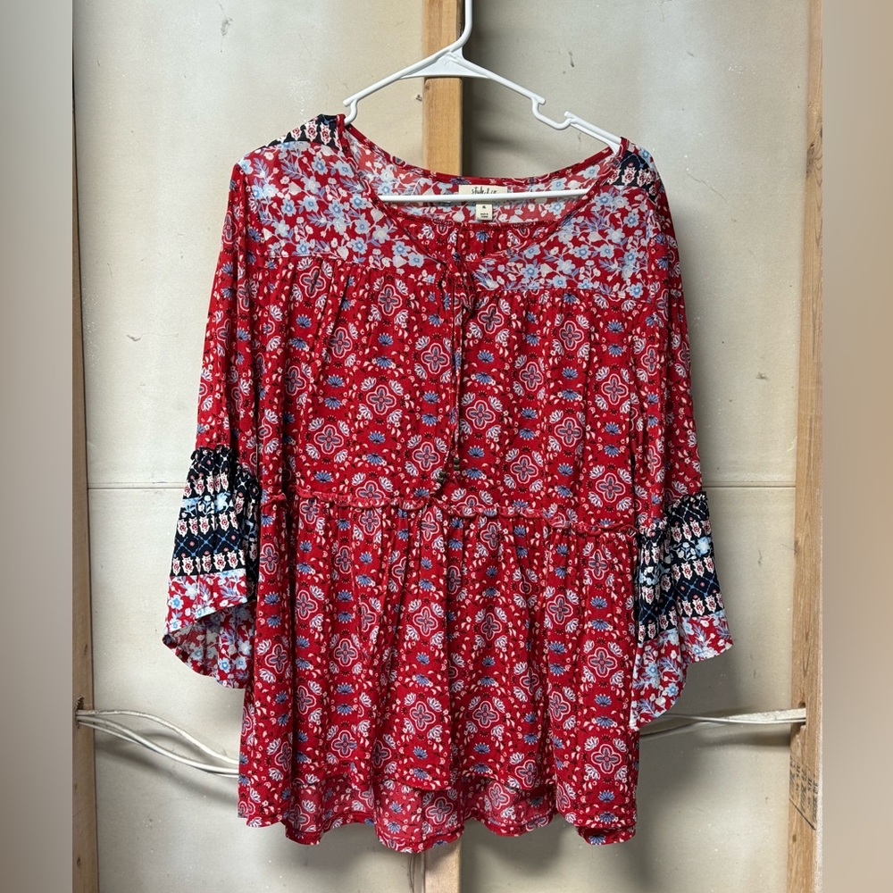 Women’s red floral shirt